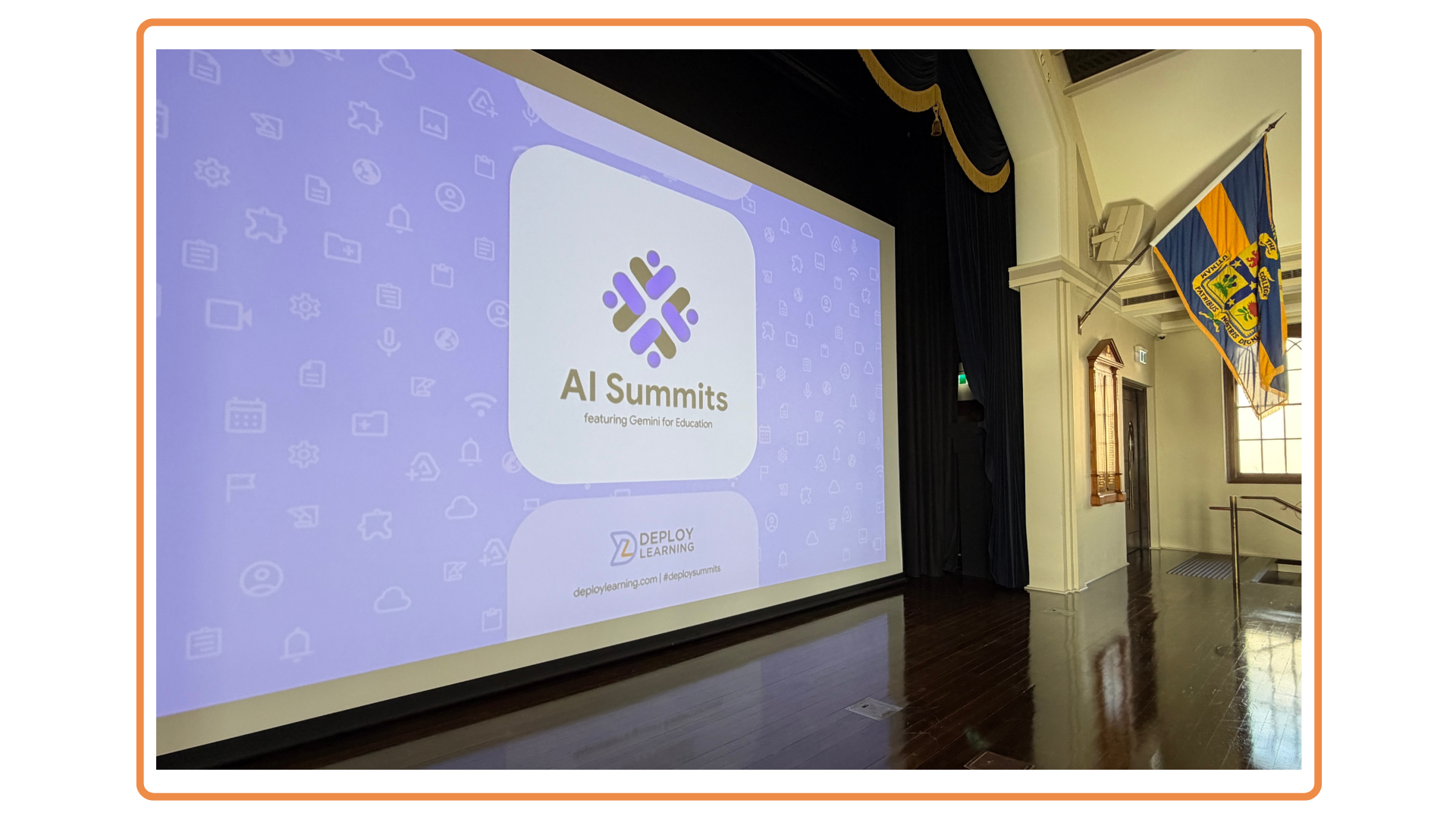 Large screen on stage featuring AI Summit